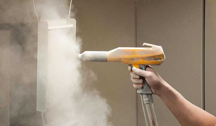 Metal part receiving a powder coating